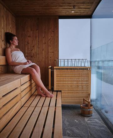 woman in the outdoor sauna