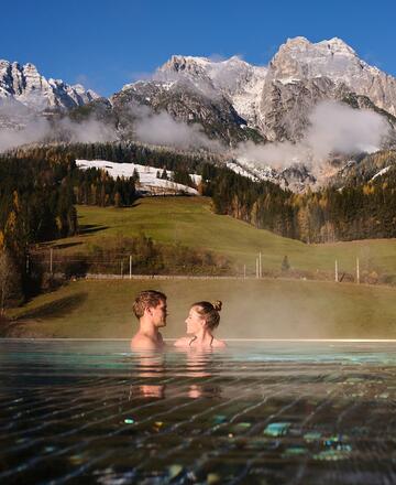couples in the infinity pool