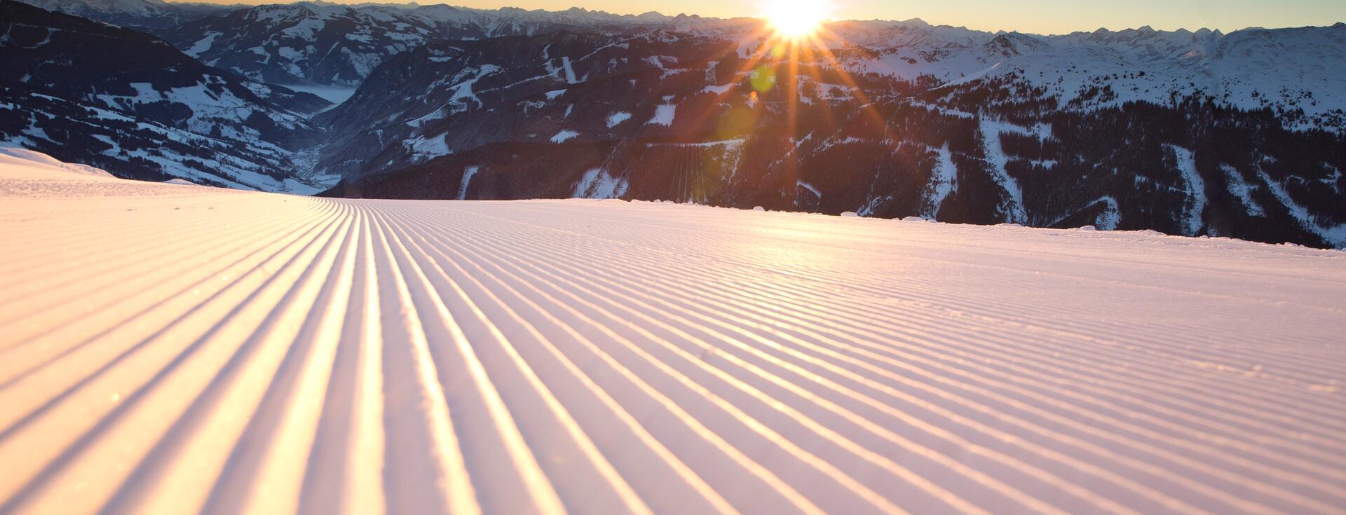 ski slope at sunset