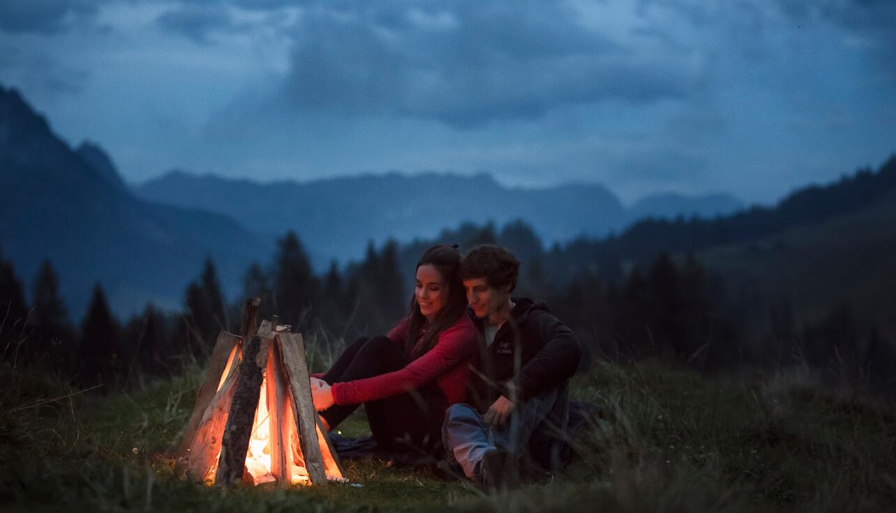 campfire romantic holiday in the mountains